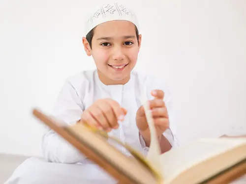Child Reading Quran